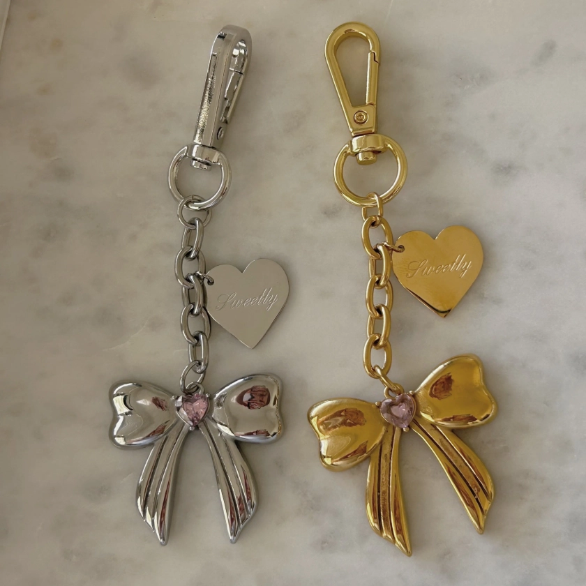 sweetly bow charm