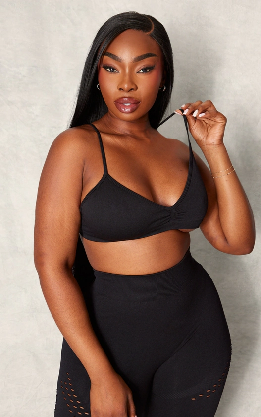 PLT Sport Plus Brassière de sport noire sans coutures à buste torsadé