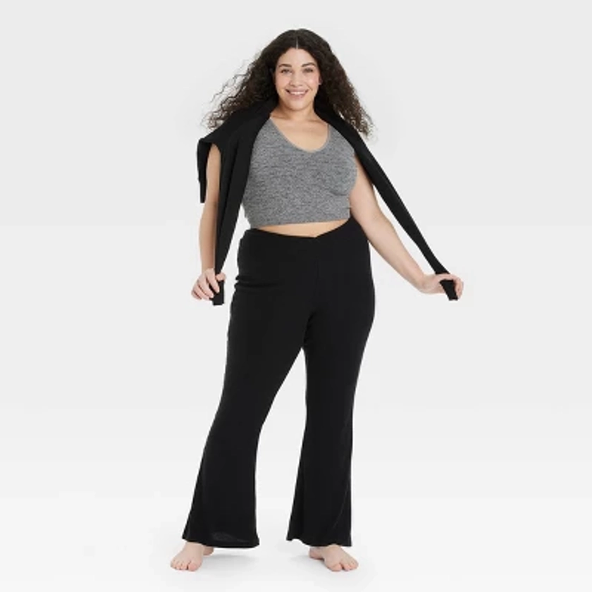 Women's Cozy Ribbed Crossover Waistband Flare Legging Pants - Colsie™ Black L