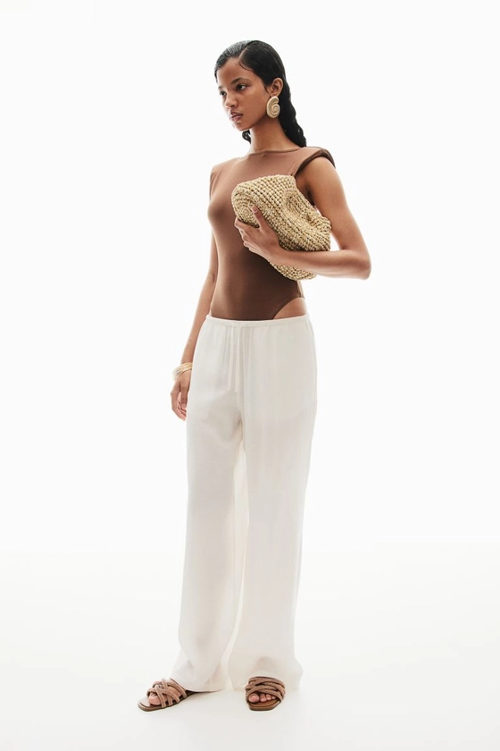Pantalon en crêpe avec taille élastique - Taille régulière - Longue - Crème - FEMME | H&M FR