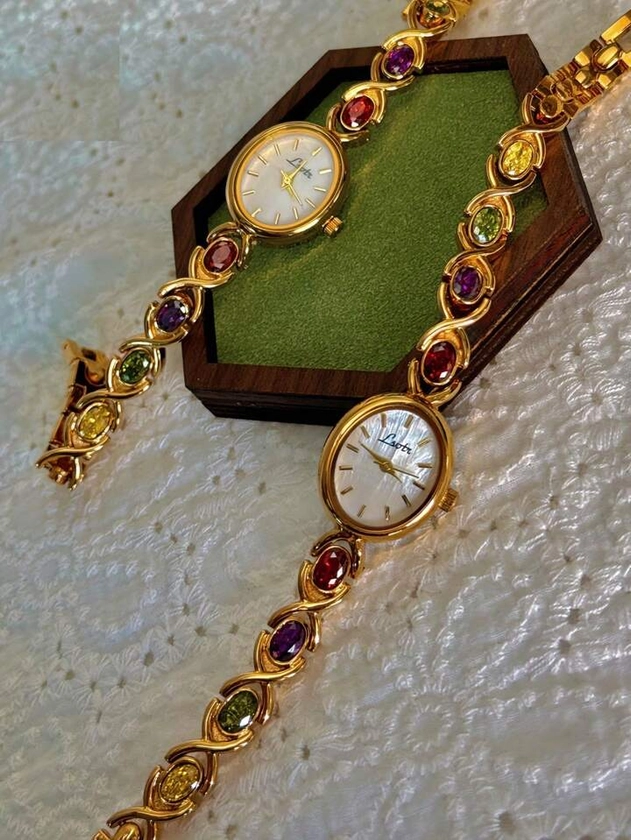 1pc New High-End Luxury Women's Watch Embedded With Colorful Tourmalines, Diamonds And An Oval Shaped Mother Of Pearl Dial. It Can Be Worn On A Daily Basis, Or For Occasions Such As Parties, Holidays And Outings To Decorate The Wrist. It Is Water Resistant Up To 30m.