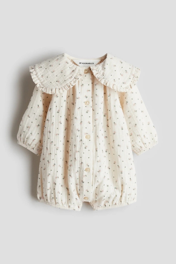 Cotton muslin romper suit - Round neck - Long sleeve - Light beige/Floral - Kids | H&M GB