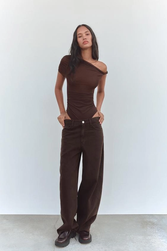 ASYMMETRIC BODYSUIT WITH KNOT