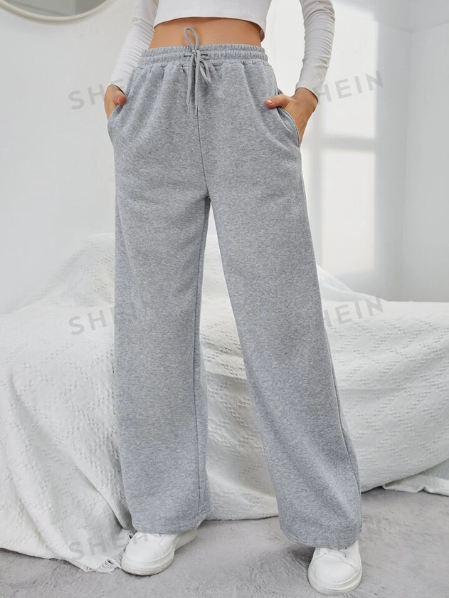 SHEIN EZwear Solid Drawstring Slant Pocket Sweatpants | SHEIN USA