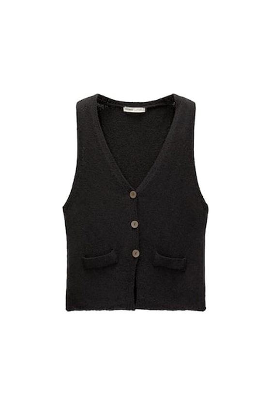 Knit vest with contrast buttons