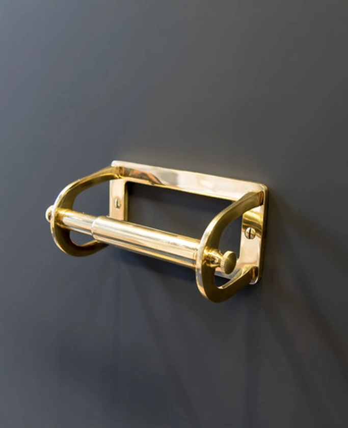 Stirrup spring loaded toilet roll holder polished brass