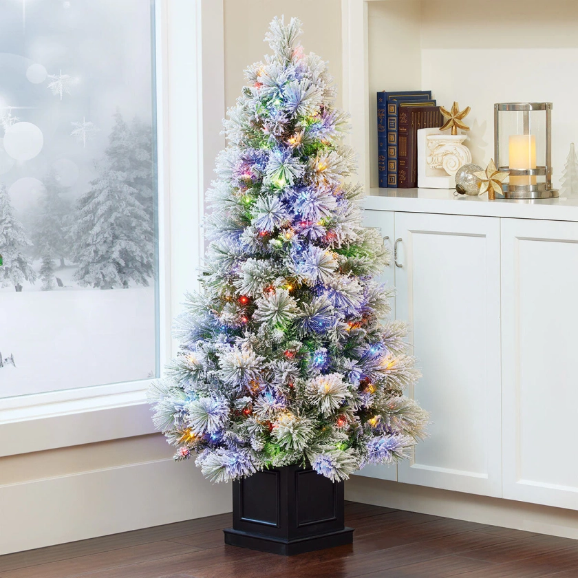 4.5ft (1.37m) Pre-Lit Glitter Flocked Potted Tree | Cost...