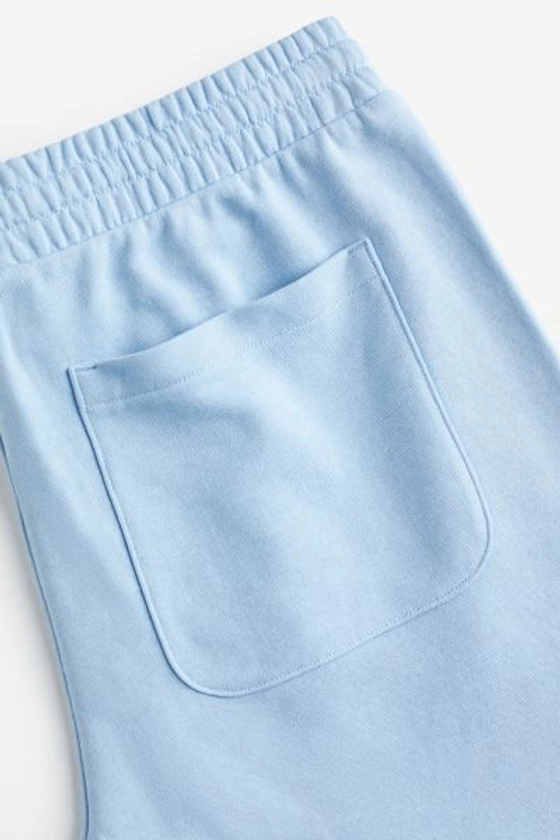 Short Regular Fit en molleton - Bleu clair - HOMME | H&M FR