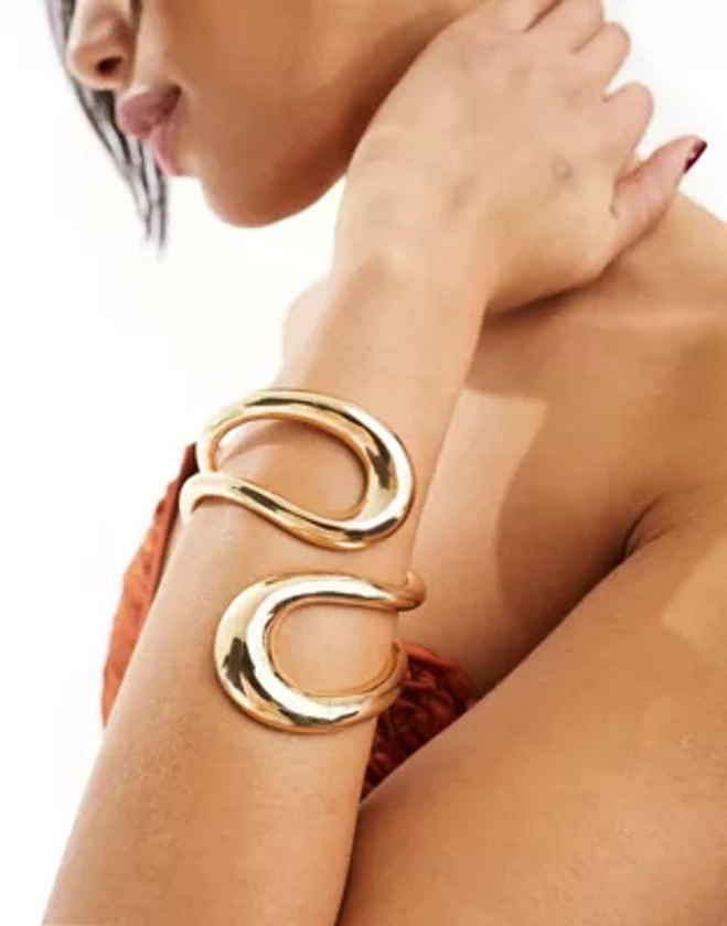 ASOS DESIGN cuff bracelet with wrap around open design in gold tone | ASOS