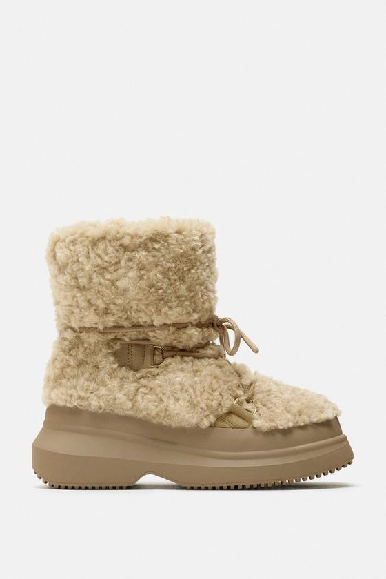 FLAT FAUX SHEARLING ANKLE BOOTS
