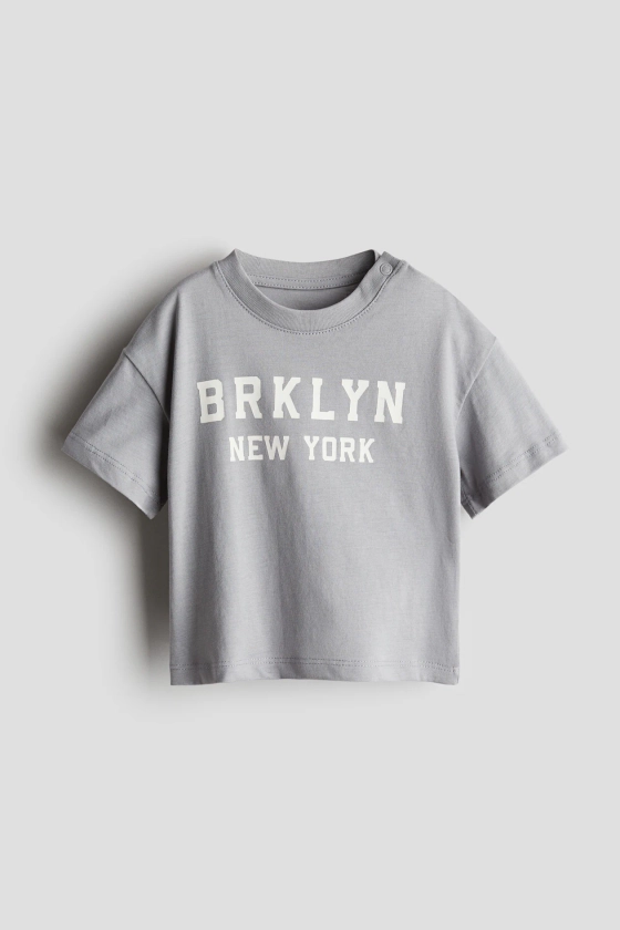 Cotton jersey T-shirt - Round neck - Short sleeve - Grey/BRKLYN - Kids | H&M GB