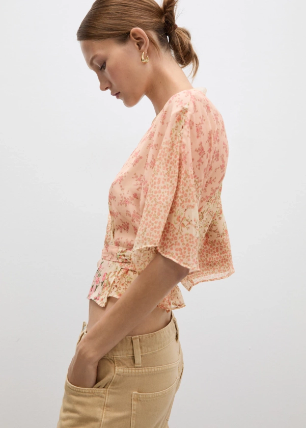 Blusa cruzada com estampado floral