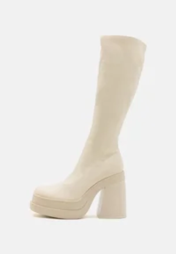 High heeled boots - off-white