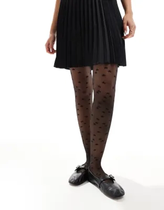 Pretty Polly all over star tights in black | ASOS