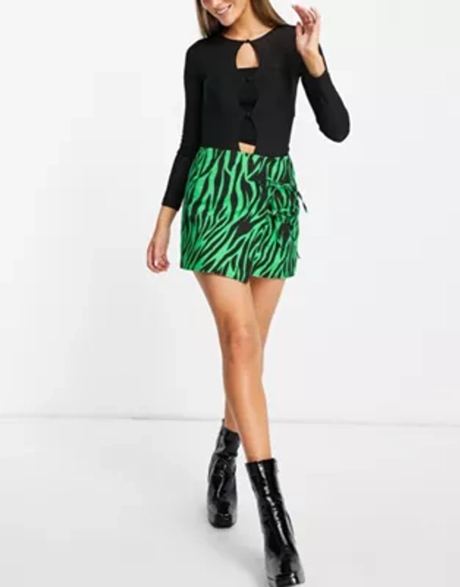 ASOS DESIGN - Mini-jupe nouée sur les côtés à imprimé animal - Vert  | ASOS