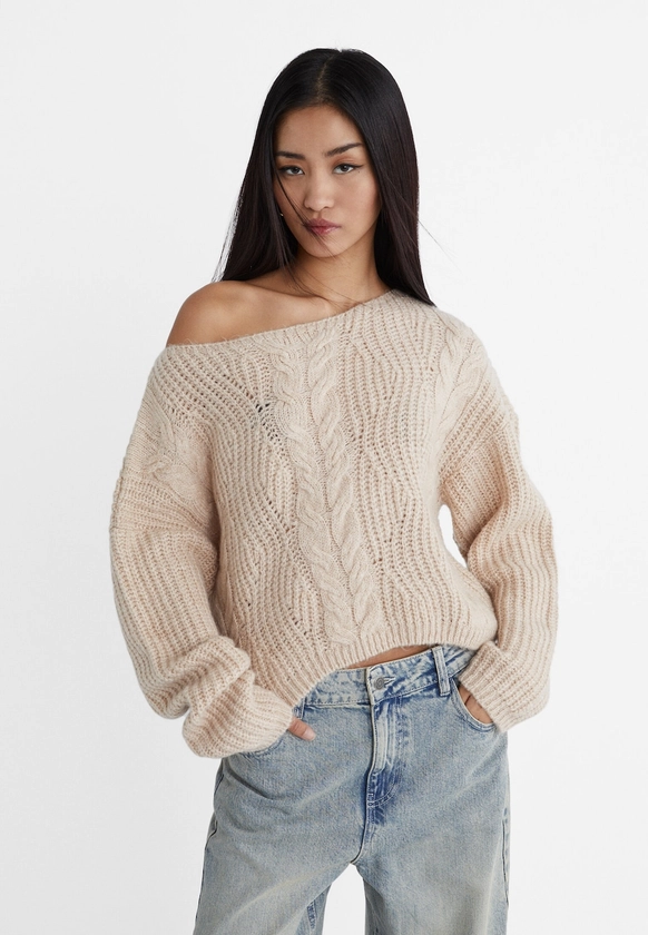 Pull en maille tressée