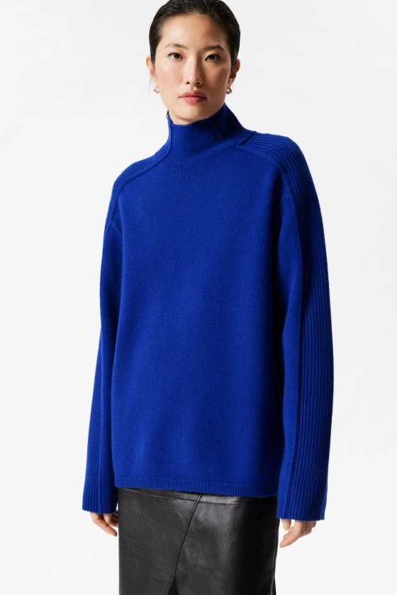 Wollen turtleneck trui met panelen - Blauw - DAMES | H&M NL