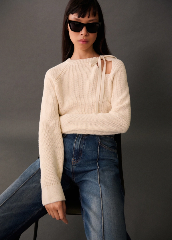 Cut-out knitted sweater