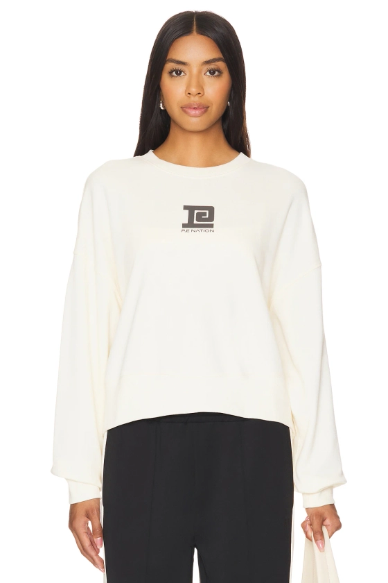 P.E Nation Medely Sweatshirt in Whisper White | REVOLVE