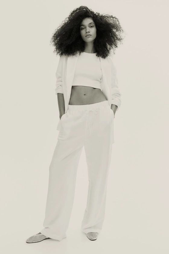 Pantalon en lin mélangé avec taille élastique - Taille haute - Longue - Blanc - FEMME | H&M FR