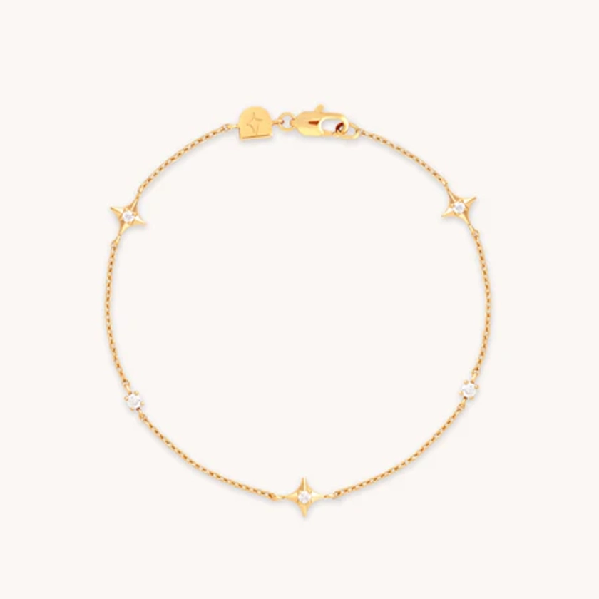 Cosmic Star Charm Bracelet in Gold