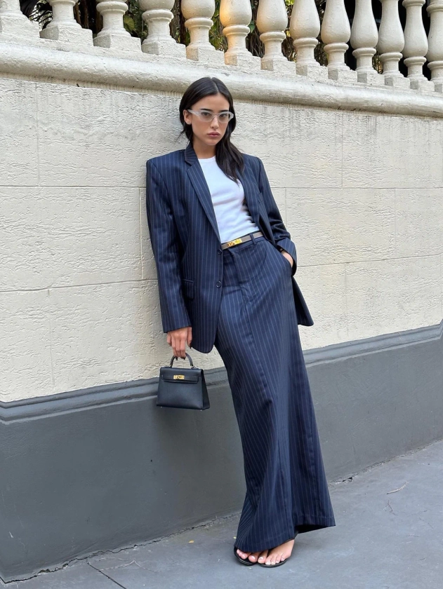 Navy pinstriped skirt suit