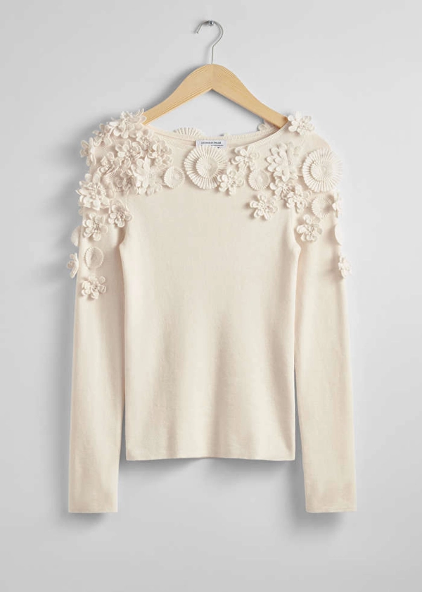 Ulltopp med blomapplikationer - Crèmevit - Tops & T-shirts - & Other Stories SE