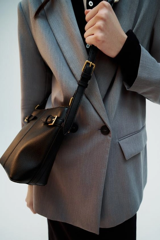 BUCKET BAG WITH BUCKLES