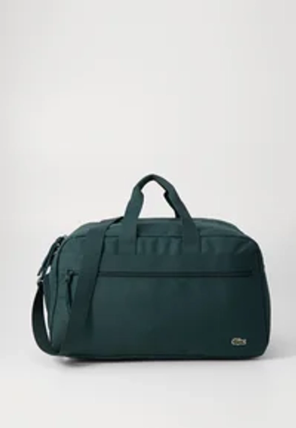 Lacoste ROLL BAG UNISEX - Reisetasche - sinople/grün - Zalando.at