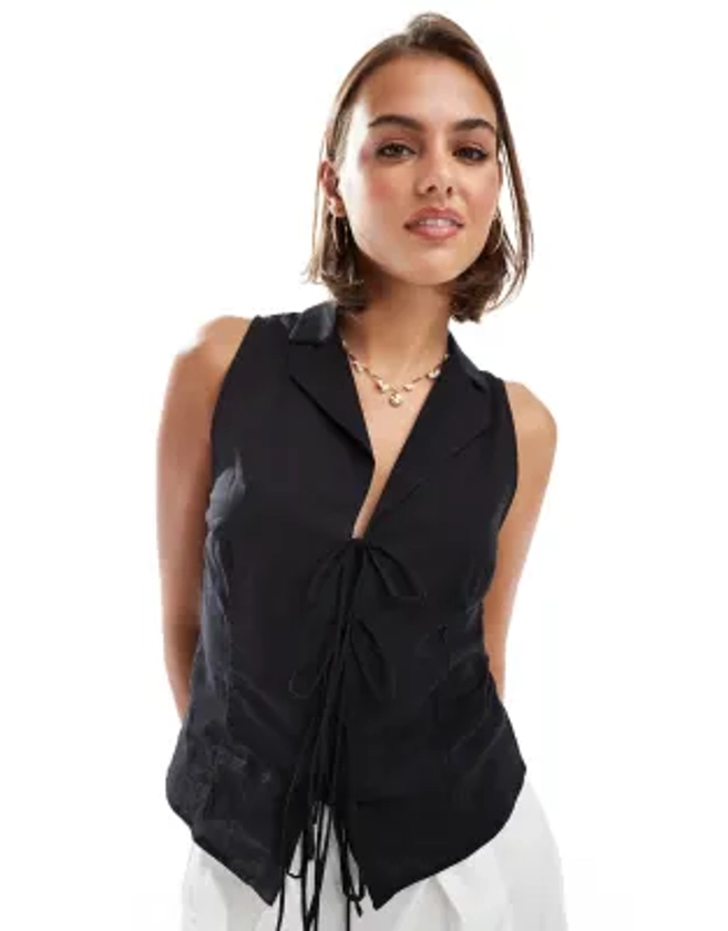 Mango - Blouse sans manches avec liens noués à l'avant - Noir | ASOS