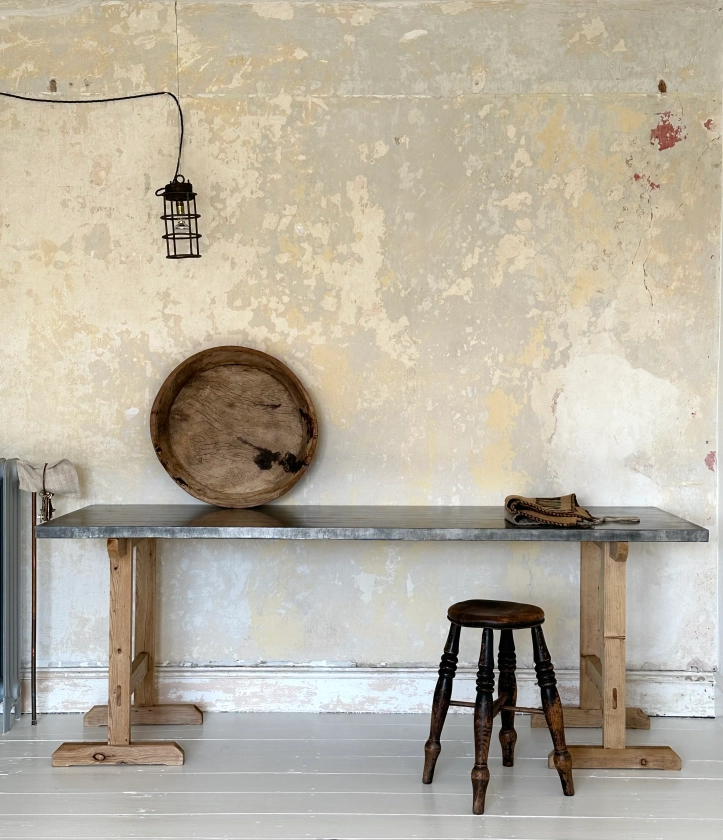 zinc top table on old wooden trestles