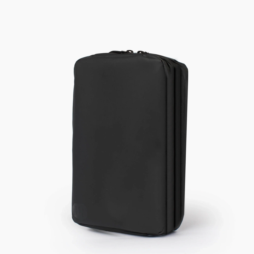 Explorer SLIM™ Toiletry Bag - Traveling Lighter
