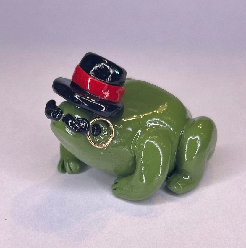 Gentleman frog figurine