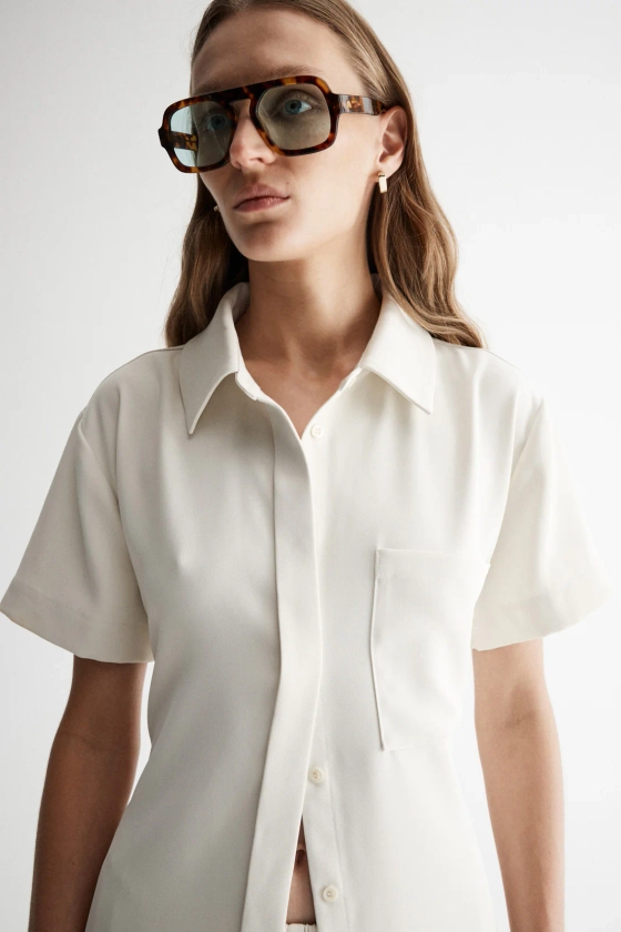 Edra Ecru Short Sleeve Tie Back Shirt – Elka Collective