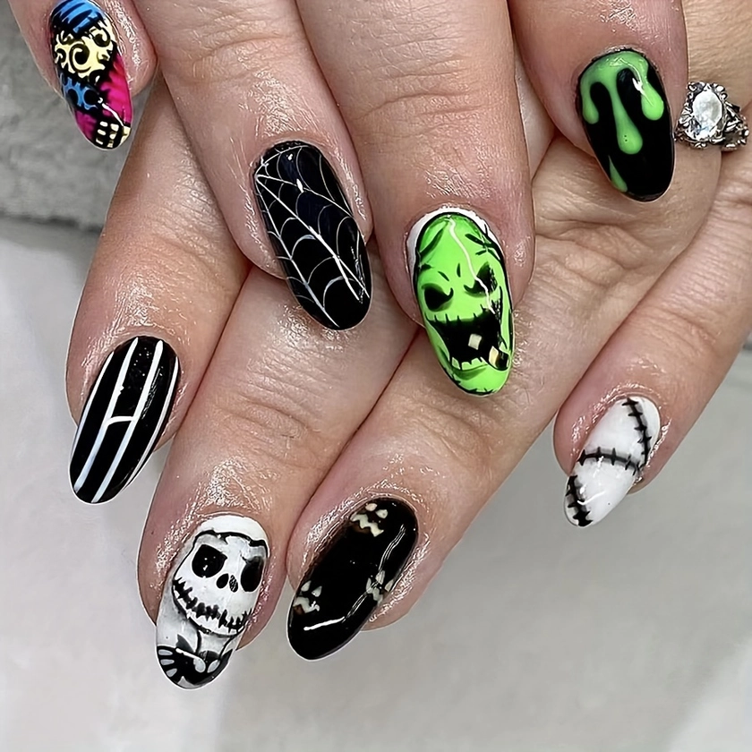 * Halloween Nails: 24 Pieces of Almond-Shaped, Press-On Nail Tips with a Mix of Colors, Featuring * like Skeletons, Spiders,
