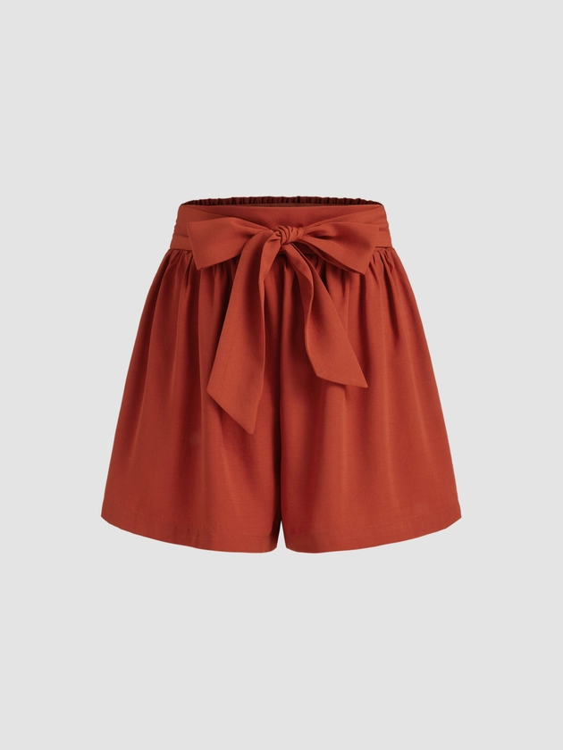 Woven Mid Rise Elastic Waist Knotted Solid Shorts