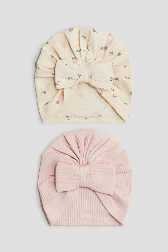 Lot de 2 bonnets avec nœud - Rose clair/fleuri - ENFANT | H&M FR