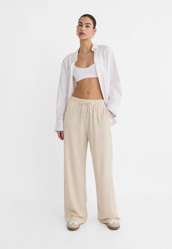 Pantalon fluide avec lin - Effet Lin femme | Stradivarius France