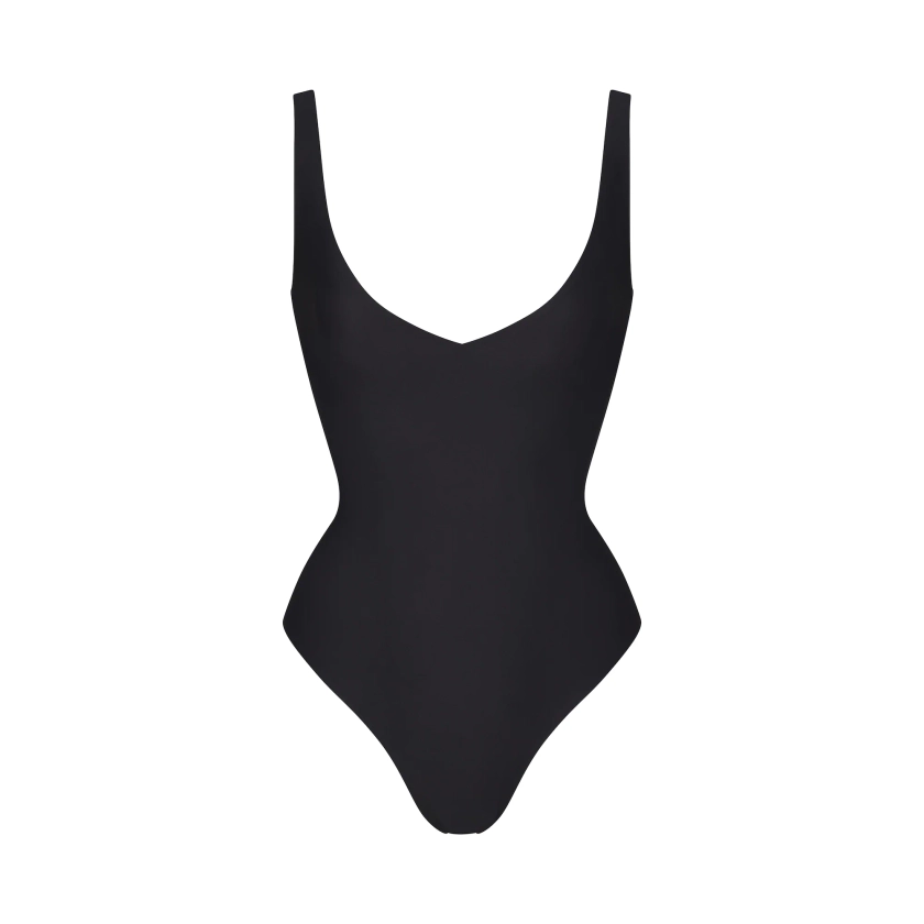 SKIMS BODY UNLINED PLUNGE THONG BODYSUIT | ONYX