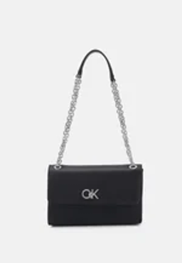 Calvin Klein RE-LOCK - Sac bandoulière - black jacquard mono/noir - ZALANDO.FR