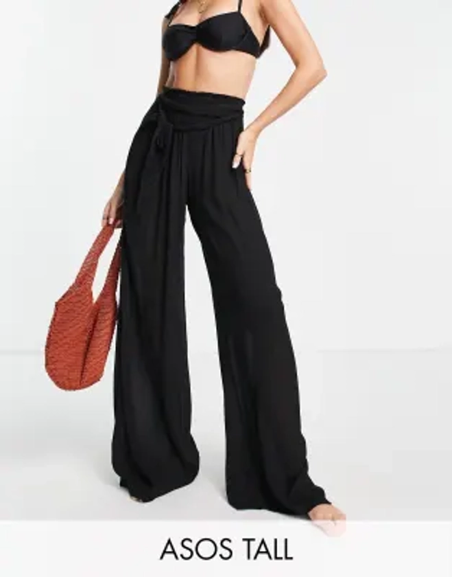 ASOS DESIGN Tall - Pantalon de plage palazzo à taille nouée - Noir