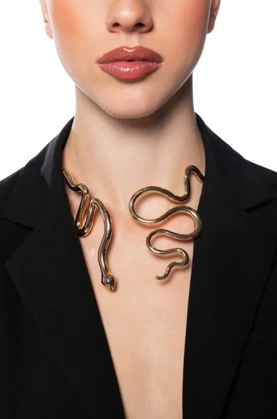 WINDING SNAKE STATEMENT NECKLACE in gold