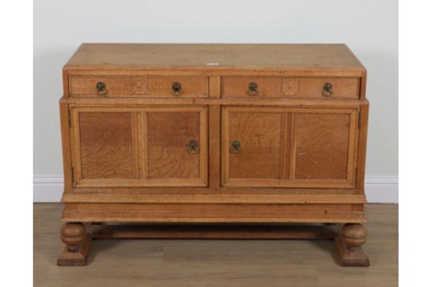 A MID-20TH CENTURY BLEACHED OAK SIDEBOARDWith pair of drawers over cupboards, 144cm wide; 50cm de
