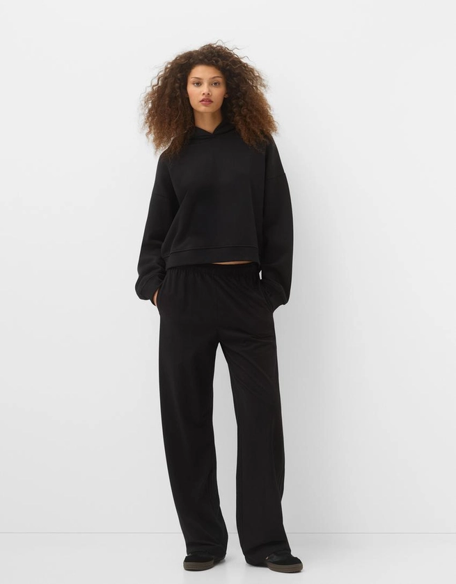 Straight-leg trousers with elasticated waistband