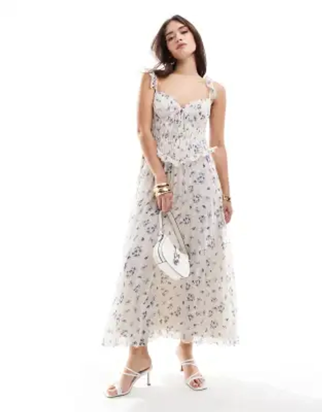 ASOS DESIGN - Robe mi-longue plissée à petites fleurs avec détails au niveau du buste et corsage smocké - Bleu