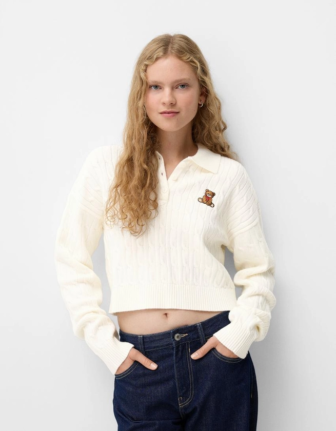 Pull col polo broderie