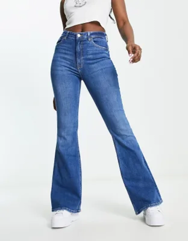 Bershka high rise flared jeans in mid blue | ASOS