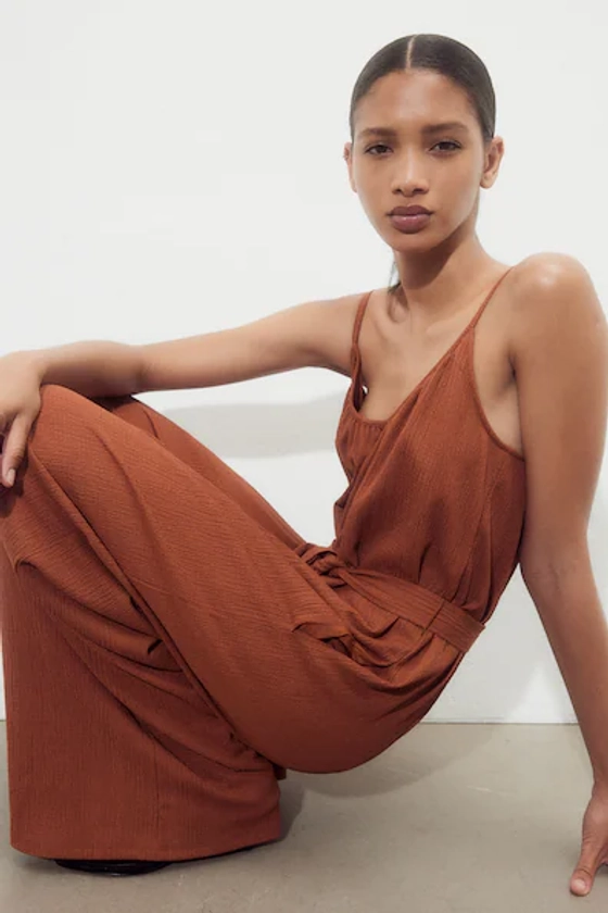 Tie-belt jersey jumpsuit