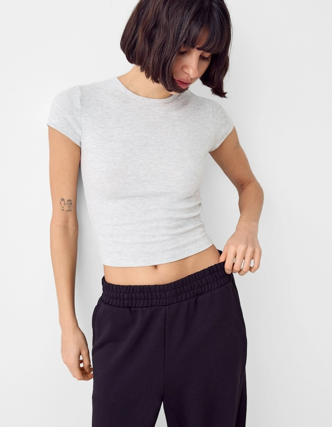 Short sleeve T-shirt with a round neck - Trousers - Women