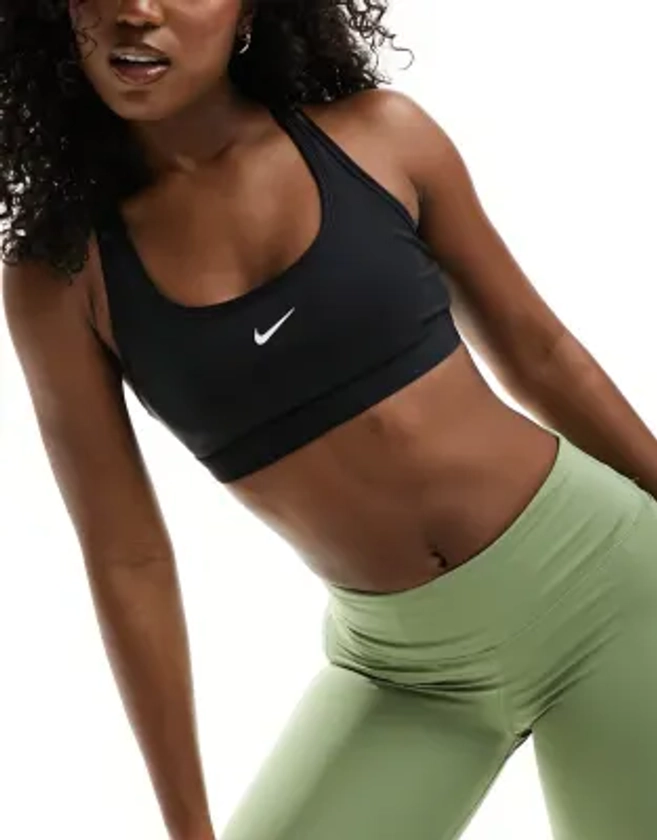 Nike Training Swoosh light support sports bra in black